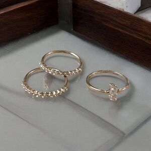 Gold Rings Set with Clear Gemstones and Solitaire Design